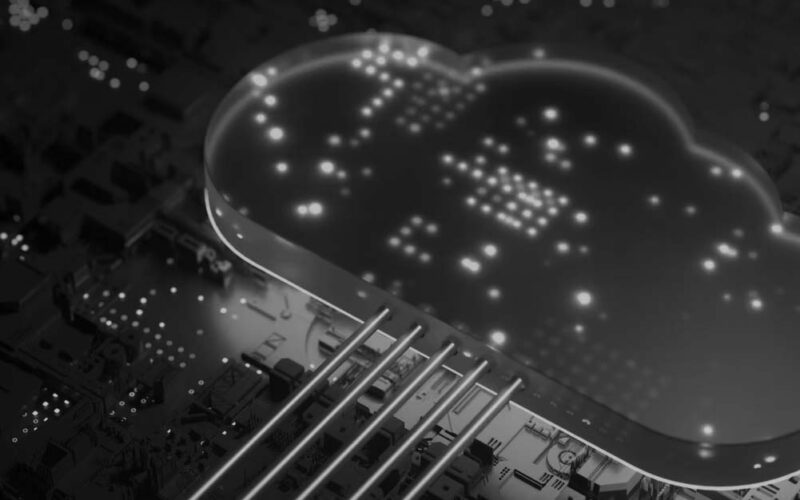 A glowing blue cloud-shaped icon hovers above a dark circuit board, with illuminated lines connecting the cloud to the board, symbolizing innovative cloud technologies and digital connectivity.
