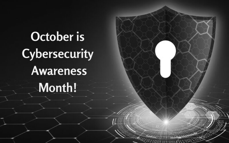 A digital shield with a keyhole is shown next to the text October is Cybersecurity Awareness Month! on a blue, futuristic network background—highlighting essential Cybersecurity Tips for Small Businesses Portland.